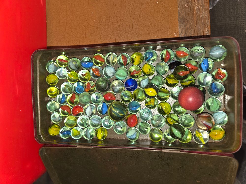 Lot 364 – A Collection of Vintage Glass Cat’s Eye Marbles in Tin