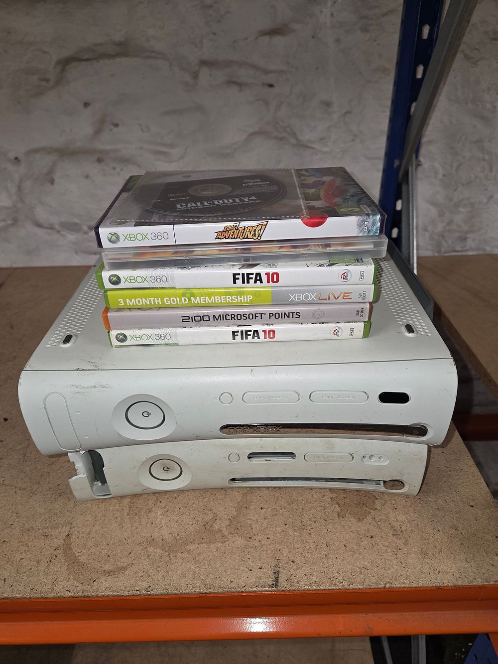 Lot 382 – Two Microsoft Xbox 360 Consoles and a Collection of Games
