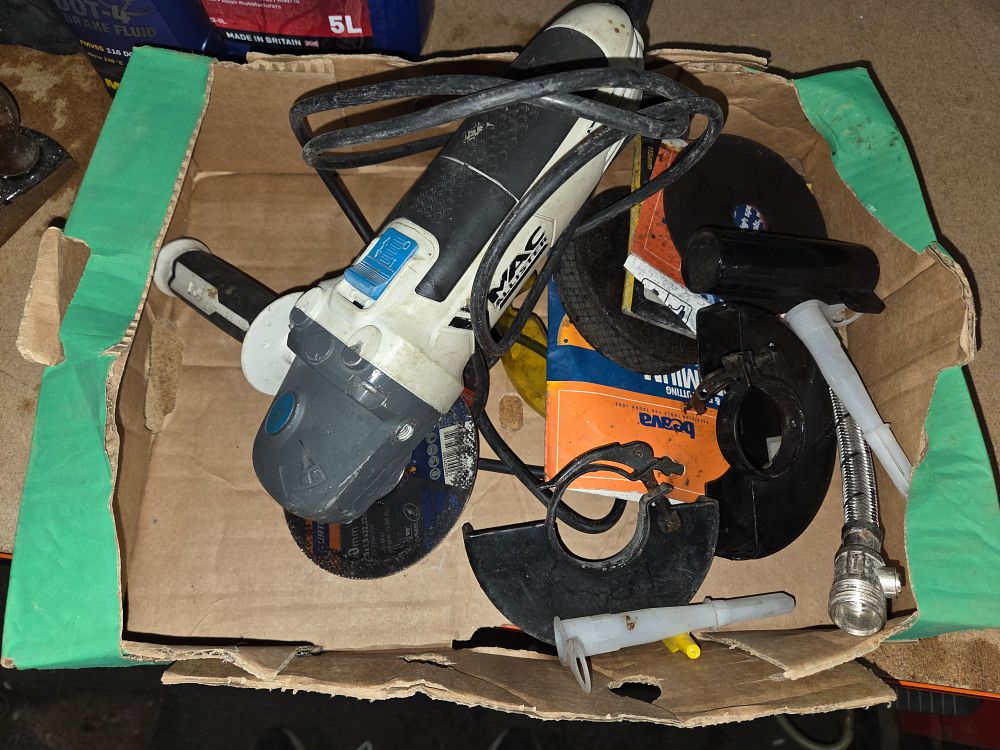 Lot 425 – Mac Allister Angle Grinder and a Collection of Accessories