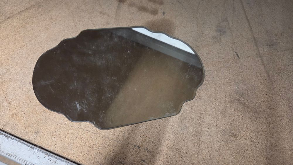 Lot 152 – Small Frameless Scalloped Edge Silver Coloured Wall Mirror