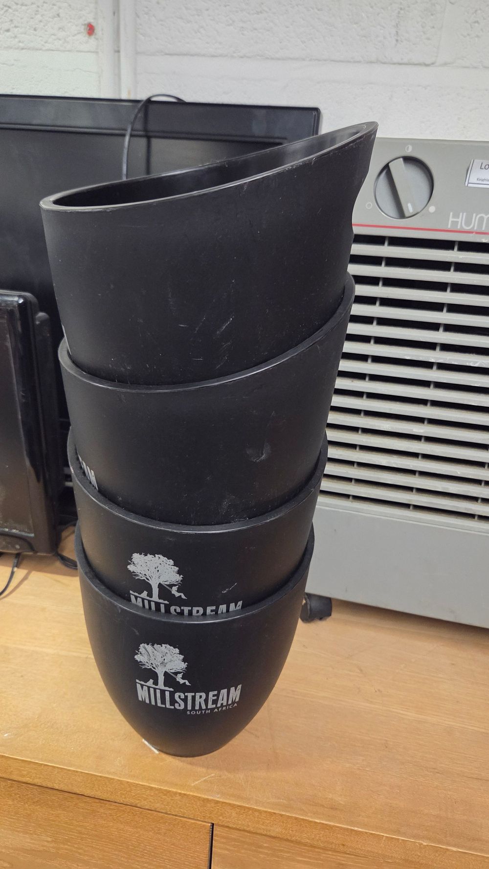 Lot 190 – A Collection of Millstream South Africa Black Plastic Ice Buckets