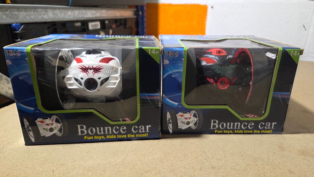 Lot 221 – A Pair of PEG Paierge Toys Bounce Cars