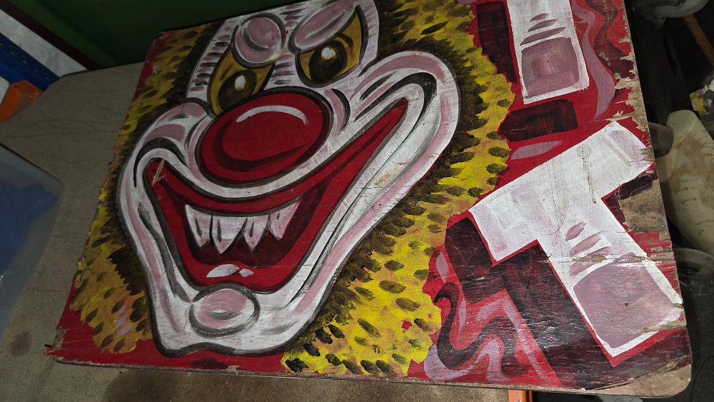 Lot 365 – Fold-away Table with Hand-painted clown face