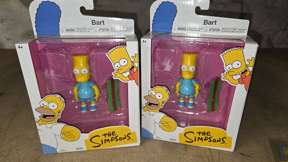 Lot 384 – A Pair of New JAKKS Pacific The Simpsons Bart Action Figures