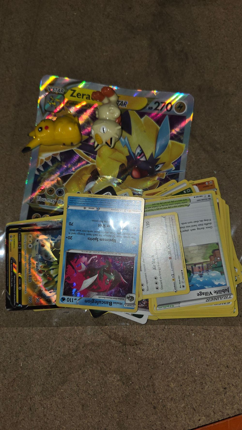 Lot 387 – A Collection of Pokémon Trading Cards and Character Figures