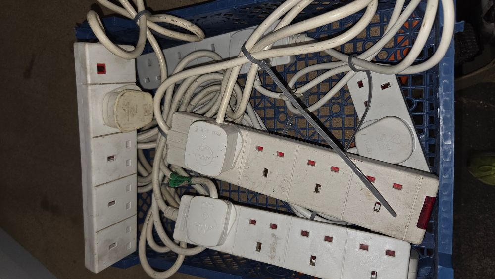 Lot 390 – A Collection of White Multi-Socket Extension Leads and Power Strips