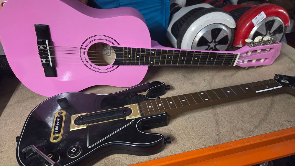 Lot 379 – Two Guitars