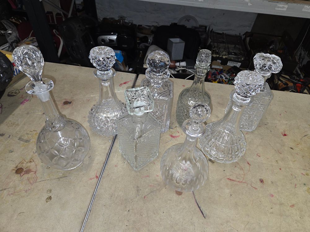 Lot 448 – A Collection of Cut Glass and Crystal Liquor Decanters