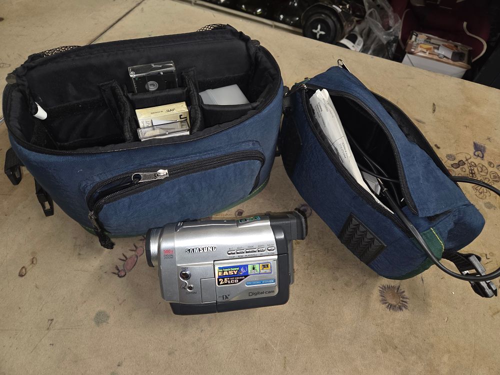 Lot 478 – Samsung VP-D70 PAL Digital Camcorder with Accessories and Bags