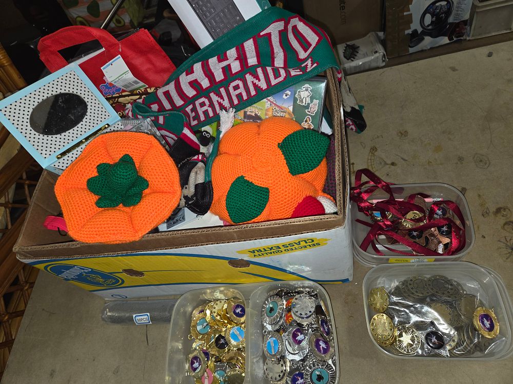 Lot 483 – A Collection of Crocheted Pumpkins, Sports Memorabilia, and Medals