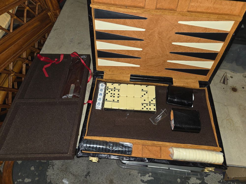 Lot 497 – A Multi-Game Set with Backgammon Board and Dominoes