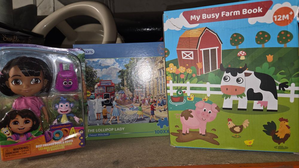 Lot 444 – A Trio of New Children’s Toys Puzzles and Books
