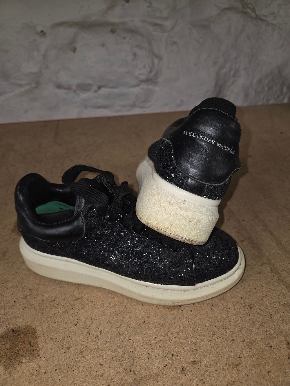 Lot 451 – A Pair of Alexander McQueen Black Glitter Oversized Sneakers