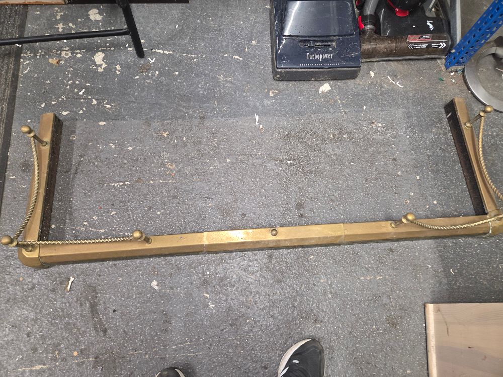 Lot 497 – Victorian Brass Fireplace Fender with Rope Metalwork