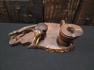 Vintage Ceylon Carved Wood Elephant and Crocodile Ashtray Desk Set. A dark brown wooden souvenir 