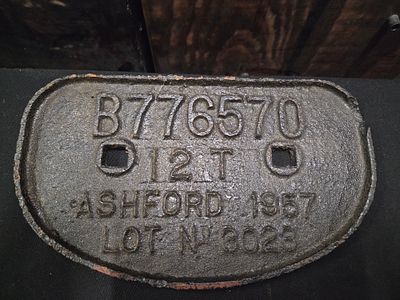 Cast Iron Ashford 1957 Railway Wagon Plate. A dark grey cast iron railway wagon plate embossed 
