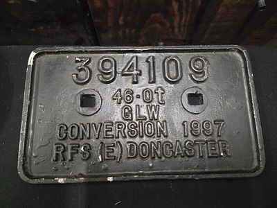 Cast Metal Railway Wagon Plate RFS Doncaster 1997. A black rectangular cast metal railway wagon 