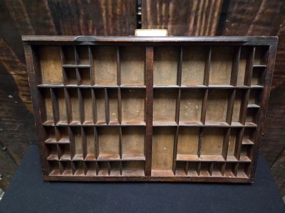 Vintage Ludlow Wooden Printers Type Drawer. A vintage dark brown wooden printer's type drawer 