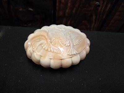 Marbled Peach and White Slag Glass Bird Trinket Box. An oval, marbled peach and white slag glass 