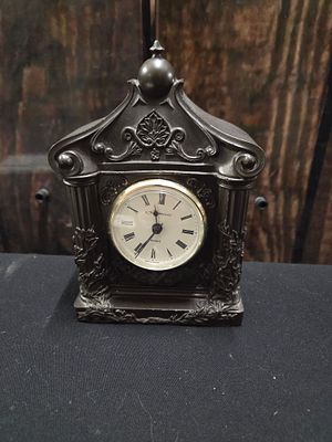 Genesis Fine Arts Bronze Ornate Quartz Desk Clock. A dark bronze-coloured ornate Genesis Fine 