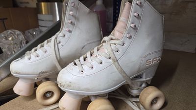 A Pair of SFR Figure Quad Roller Skates Size 4