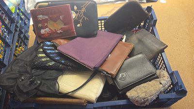 A Collection of Assorted Wallets Purses and Pouches