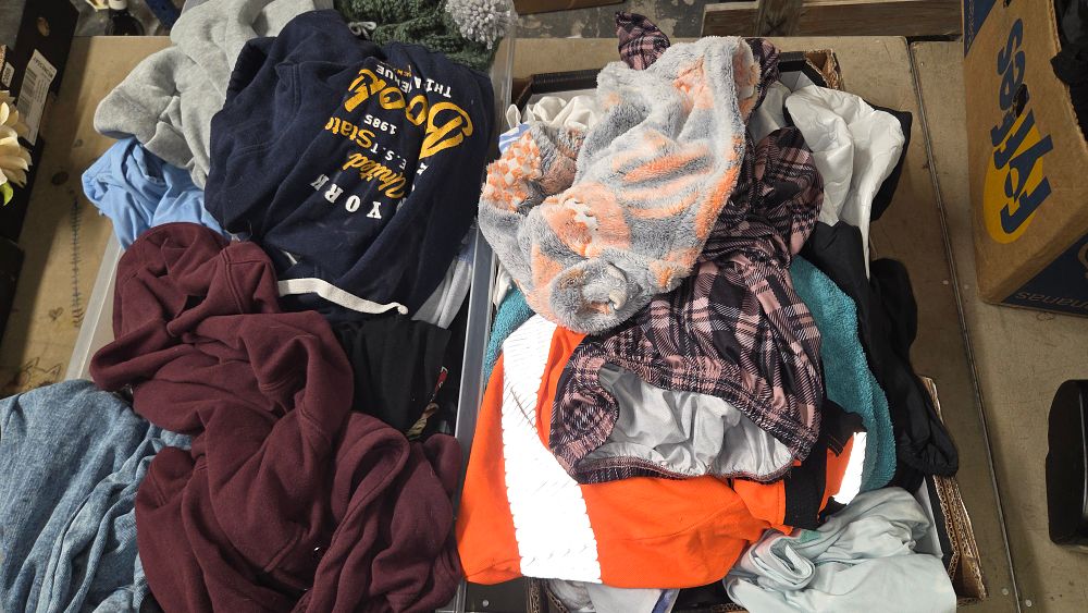 Lot 152 – Two Boxes of Clothing