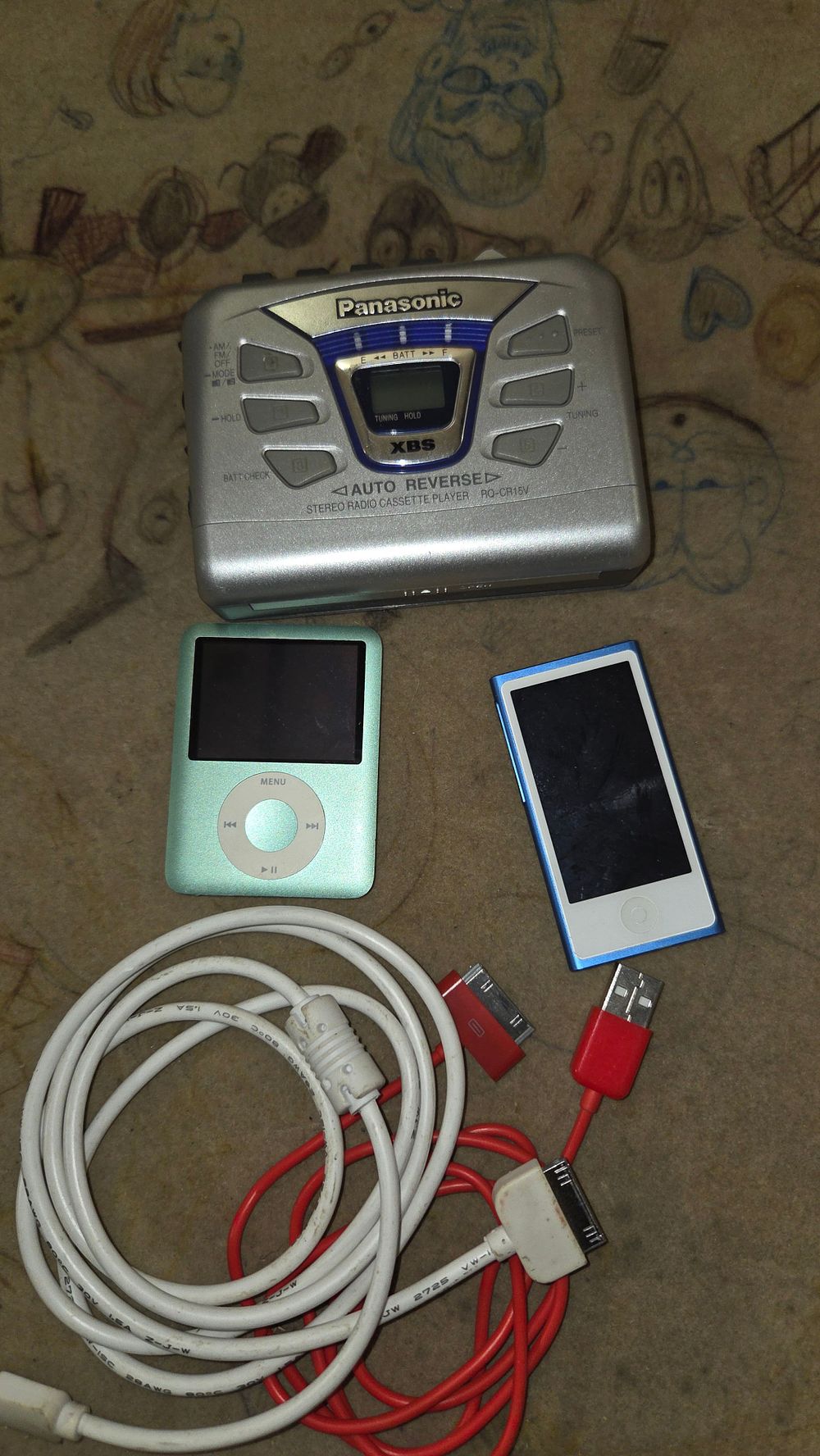 Lot 159 – A Collection of Portable Media Players and Cables