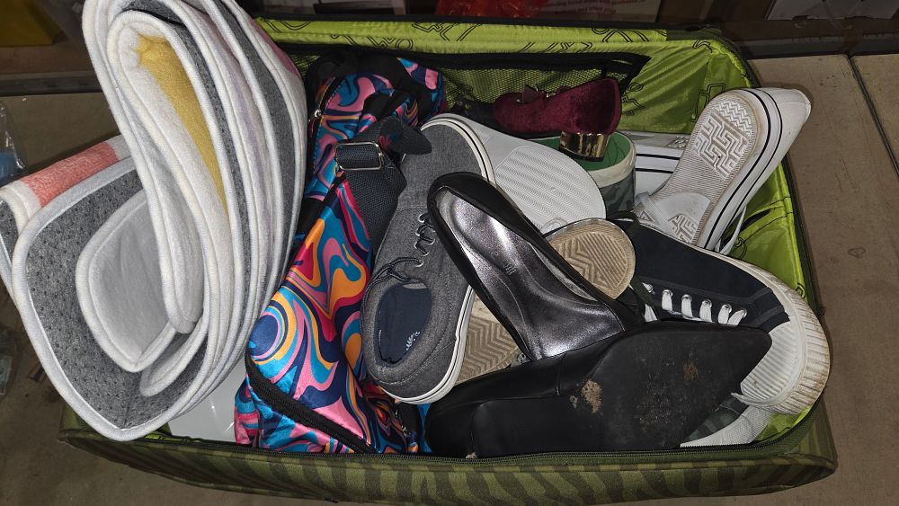 Lot 178 – Suitcase of Shoes etc