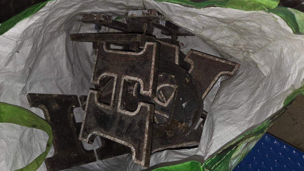 Lot 191 – A Collection of Weathered Cast Metal Industrial Sign Letters