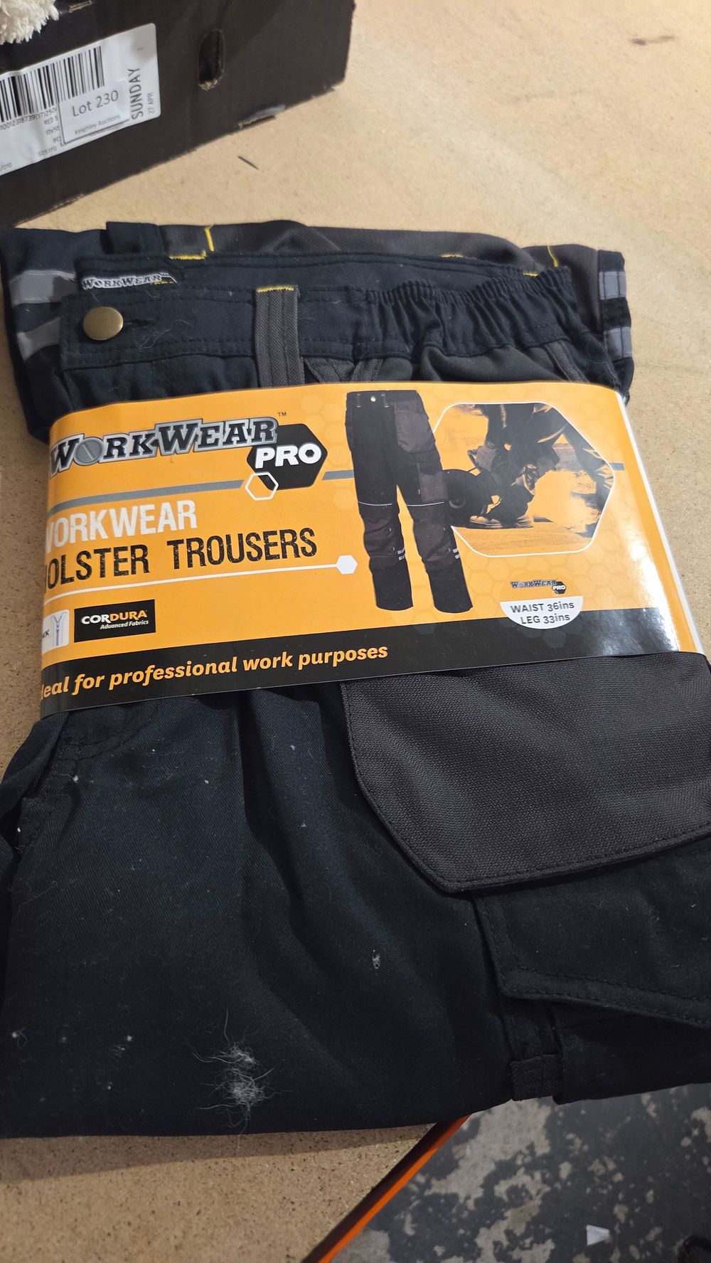 Lot 231 – A Pair of New Workwear Pro Black Holster Trousers