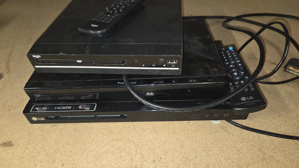 Lot 243 – Three DVD Players and Remote Controls