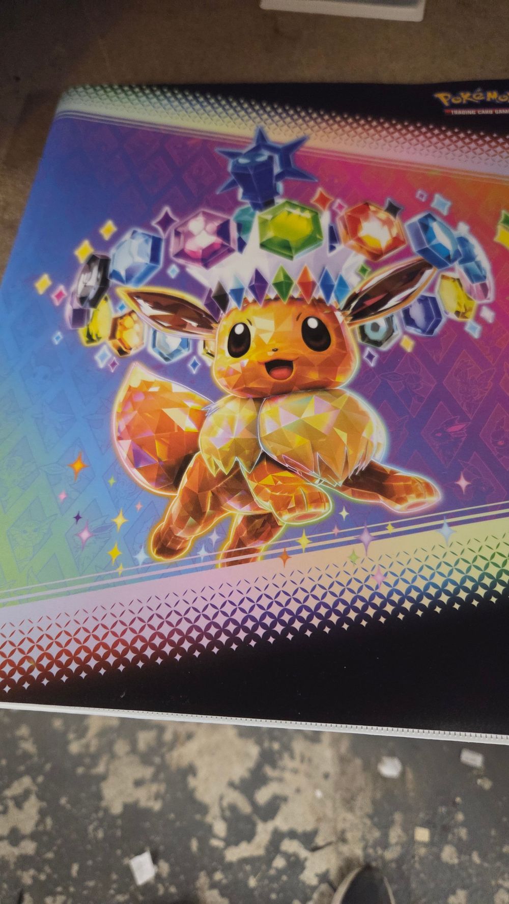 Lot 356 – A Collection of Pokémon Trading Cards in Prismatic Evolutions Binder