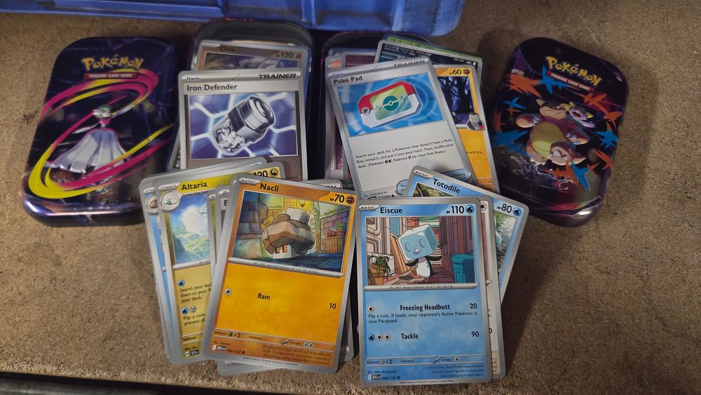 Lot 359 – A Collection of Pokemon Trading Card Game Tins and Cards