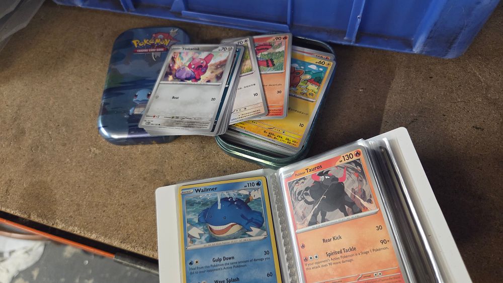 Lot 360 – A Collection of Pokémon Trading Cards with Tin and Binder