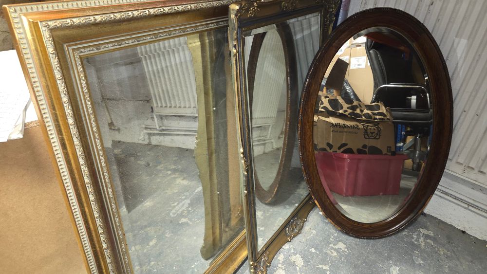 Lot 406 – Three wall mirrors with ornate gold and wood frames
