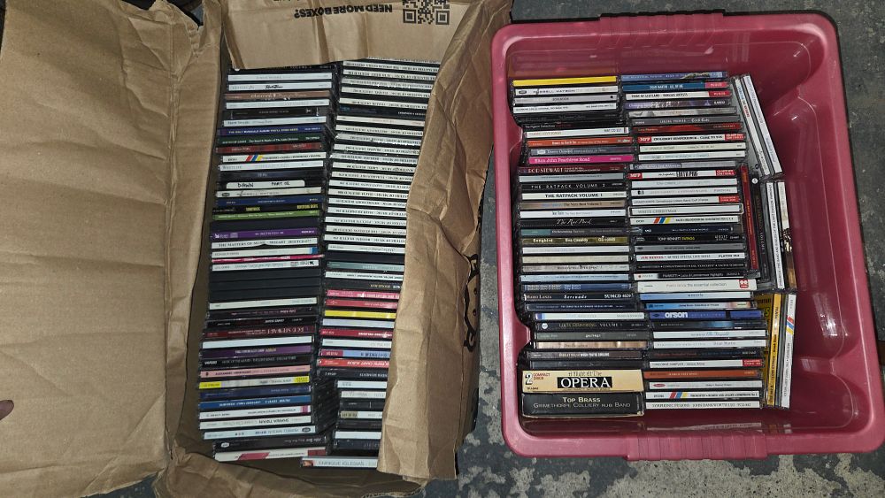 Lot 407 – Two Boxes of Assorted CD’s