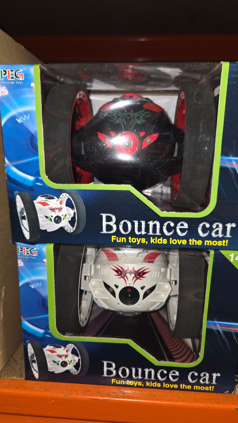 Lot 437 – Two of PEG Paierge Toys Remote Control Bounce Cars