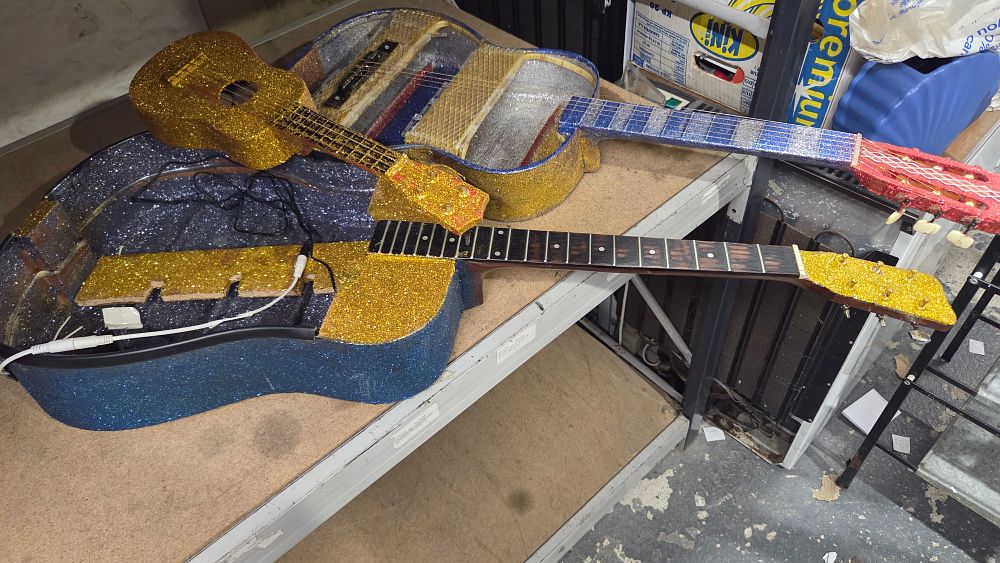 Lot 446 – A Collection of Glitter Covered Modified Stringed Instruments
