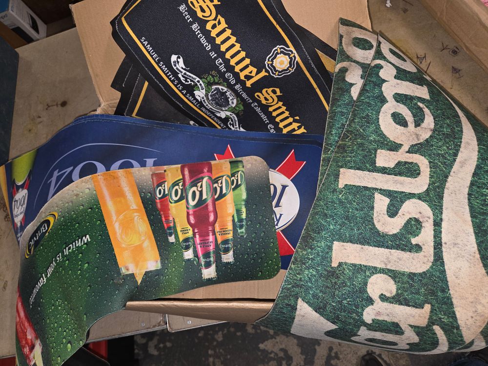 Lot 528 – A Collection of Branded Bar Mats Including Carlsberg and Britvic