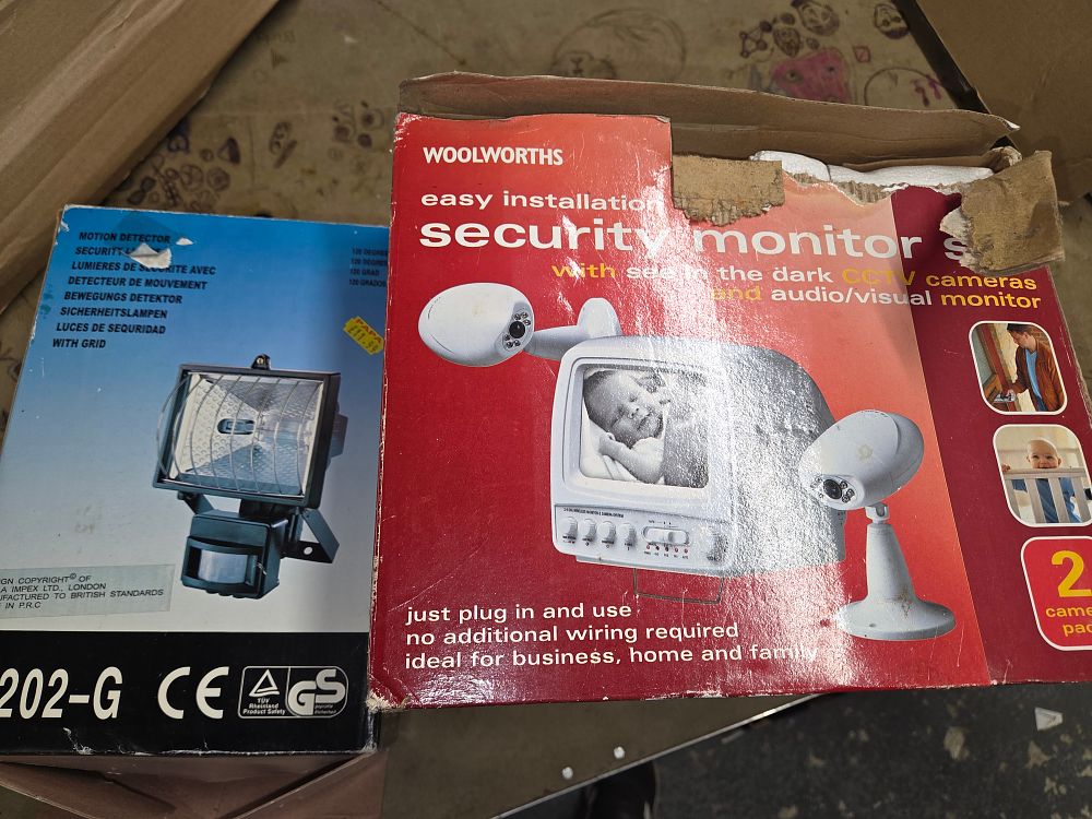 Lot 534 – Two Boxed Security Items Including a Woolworths Monitor System w/o