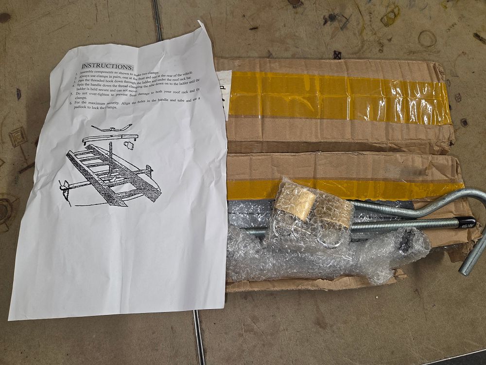 Lot 536 – A Collection of Vehicle Roof Rack Ladder Clamp Components