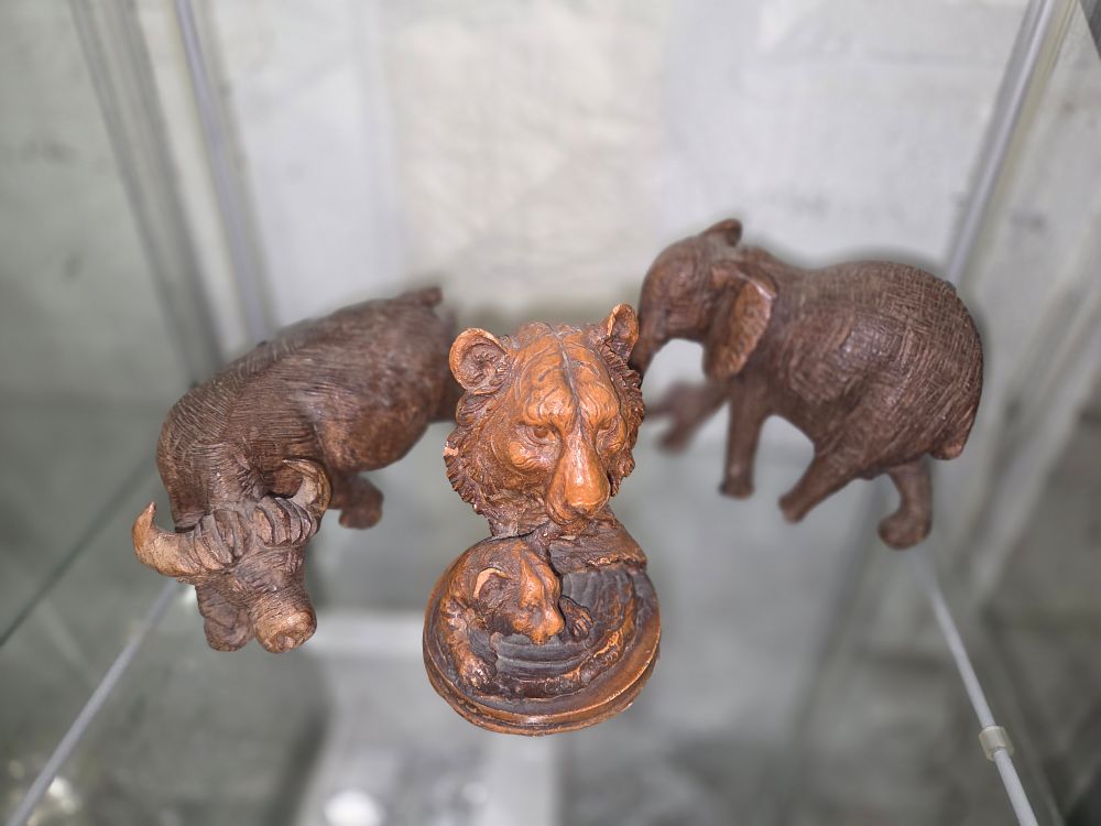 Lot 601 – A Trio of Carved Brown Animal Figurines