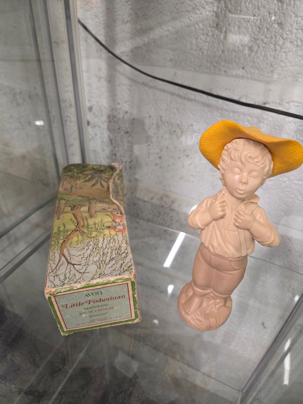 Lot 608 – Avon Little Fisherman Moonwind Eau de Cologne Figurine with Box