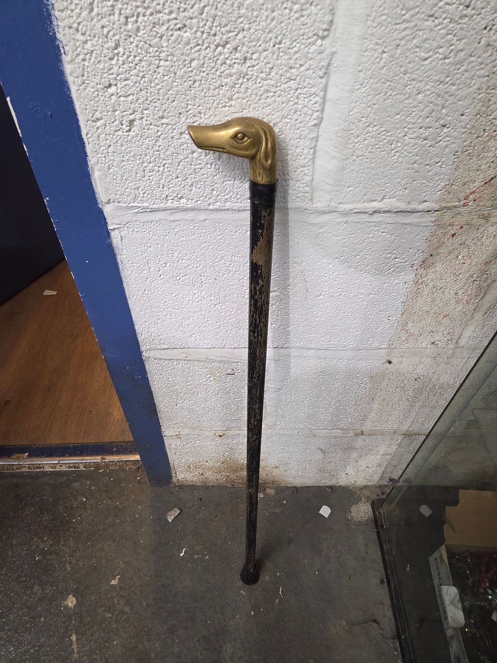 Lot 616 – Black Walking Stick with Bras Dog Head Handle