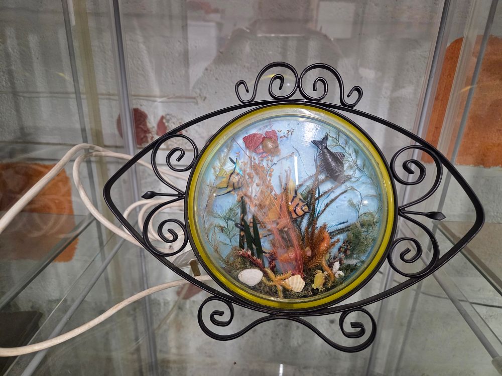 Lot 619 – Illuminated Aquarium Diorama in Metal Scrollwork Frame