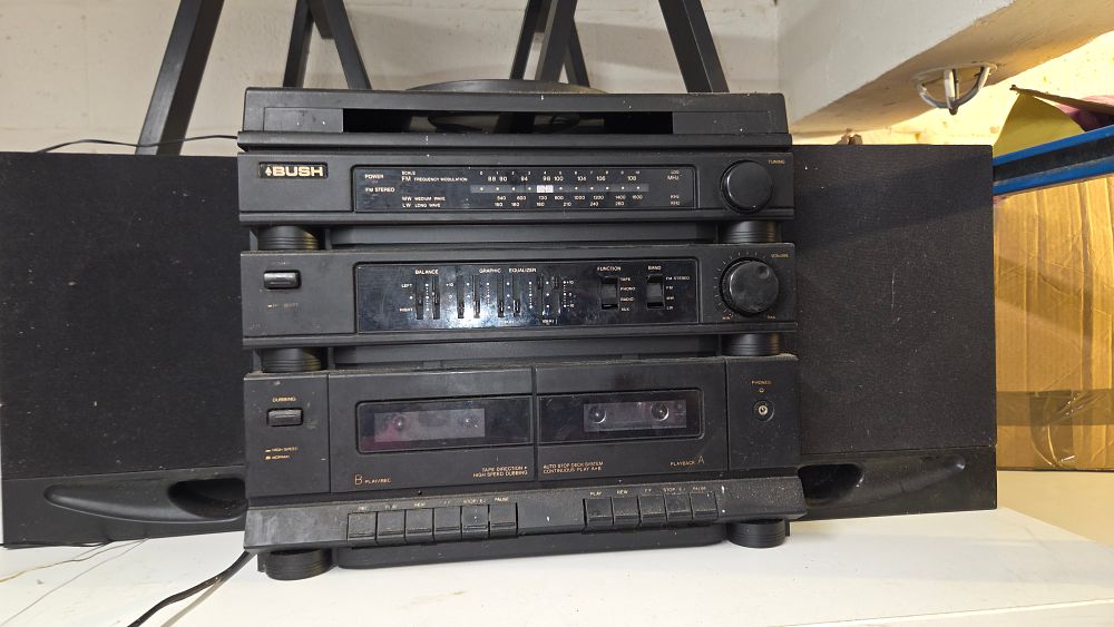 Lot 231 – A Bush hi-fi stereo system with two matching speakers