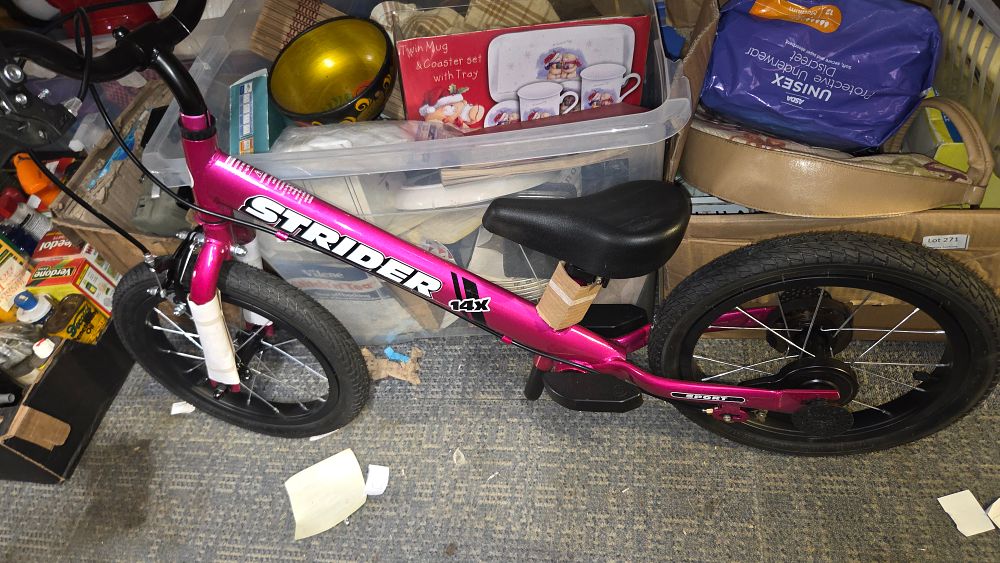 Lot 274 – Strider 14x Sport Balance Bike in Metallic Pink