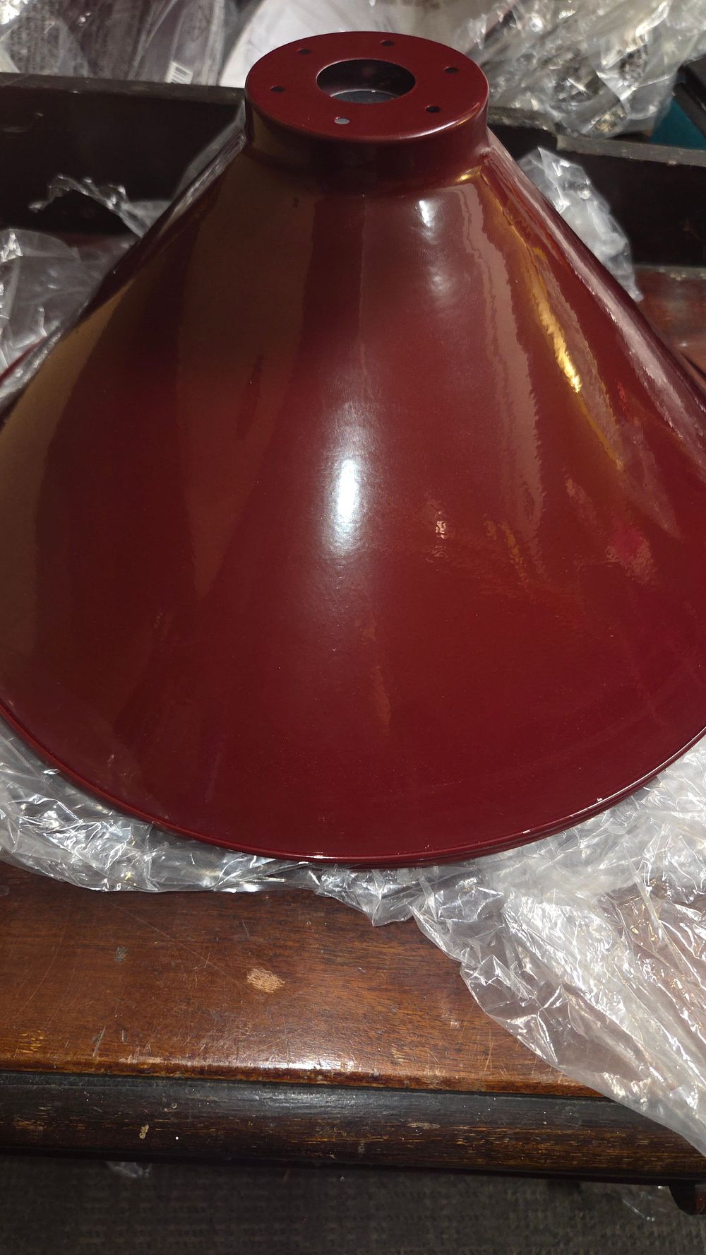 Lot 366 – Five maroon industrial style metal conical lampshades