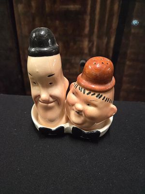 A Pair of Beswick Laurel and Hardy Salt and Pepper Shakers